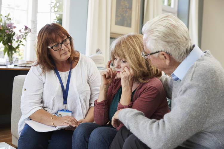 Support worker visits senior woman